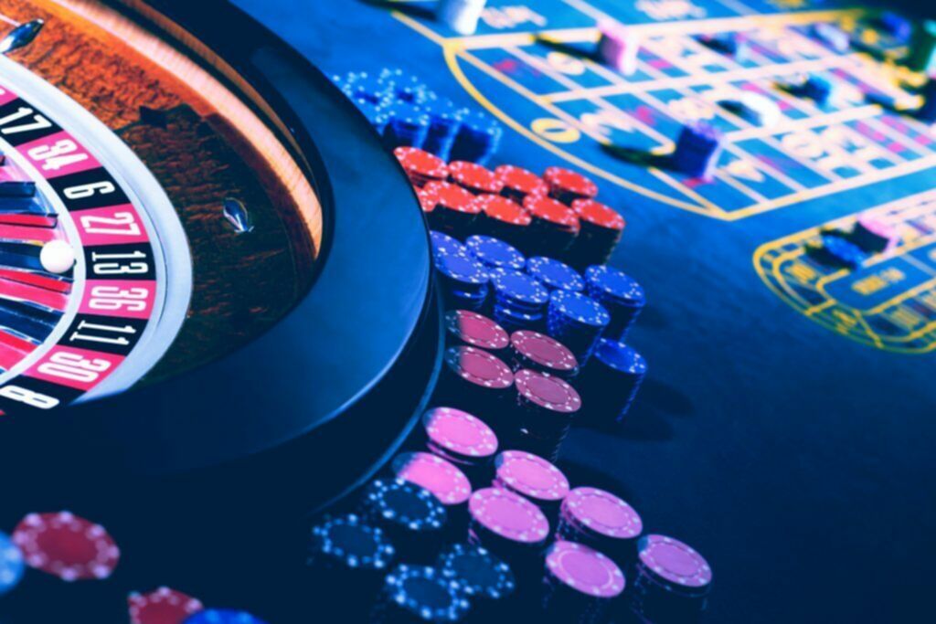 a roulette wheel, table and chips