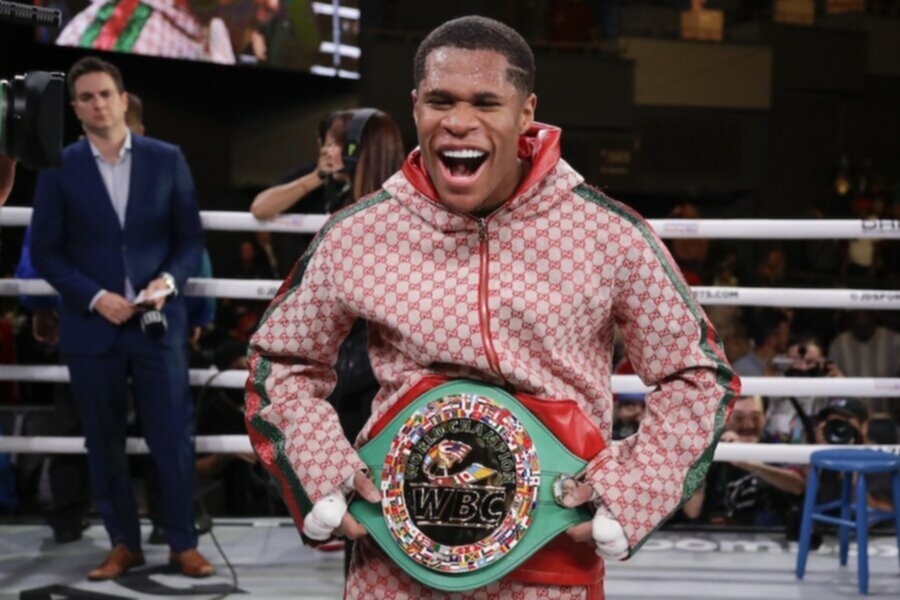 devin haney celebrates with belt after wbc interim world lightweight championship