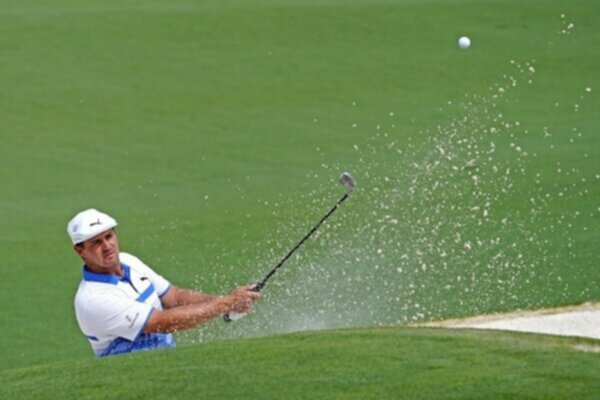 Bryson DeChambeau hit a bunker shot